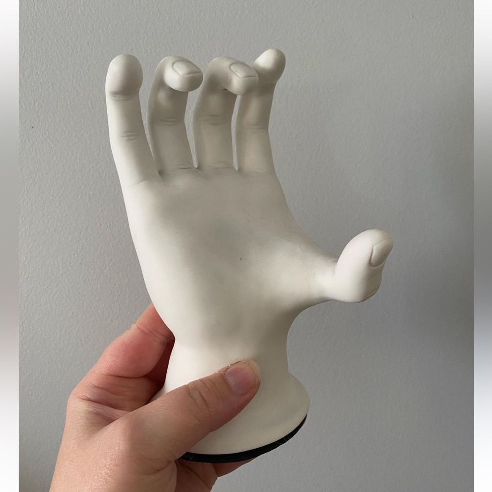 Hand shaped photo holder